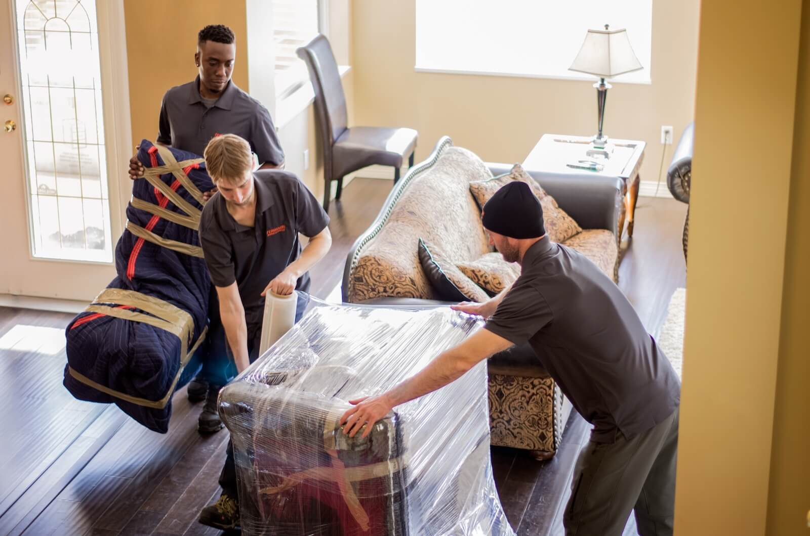 Ferguson crew packing furniture during a residential move.