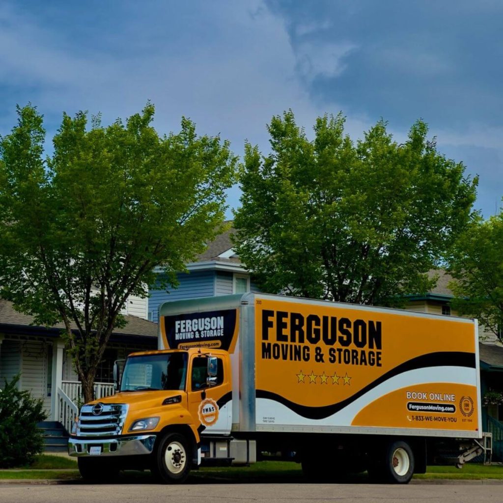 A Ferguson moving truck is parked in in a residential neighbourhood during a move.