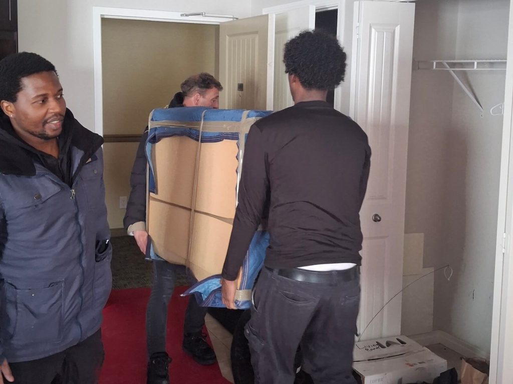 Ferguson team moving furniture out of a Calgary home.