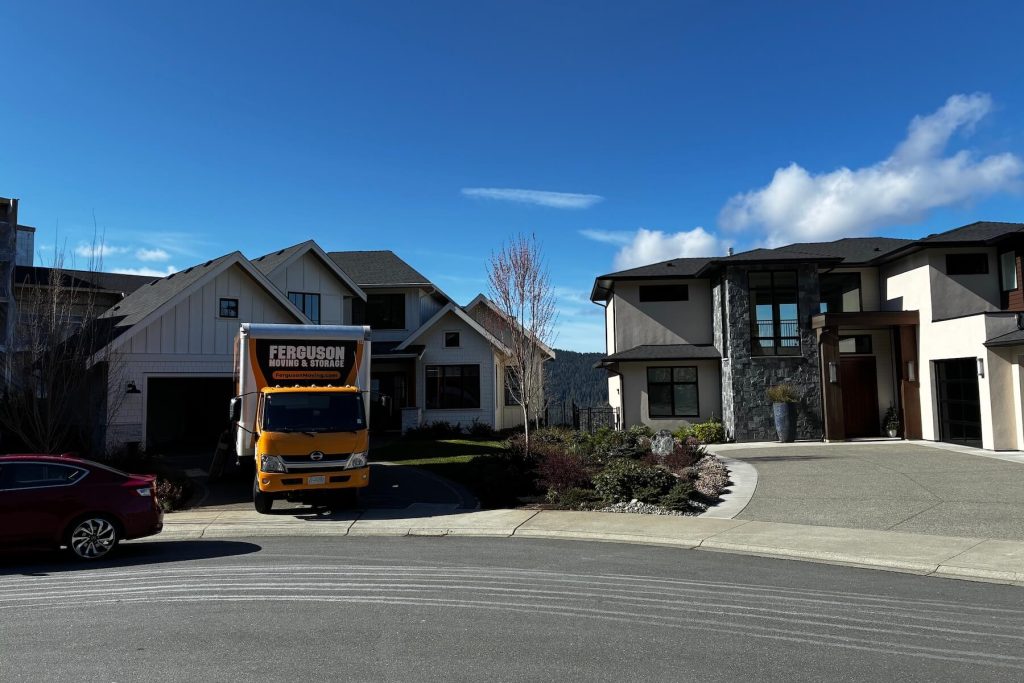 Moving truck parked in Bear Mountain near Langford, BC during a residential move.