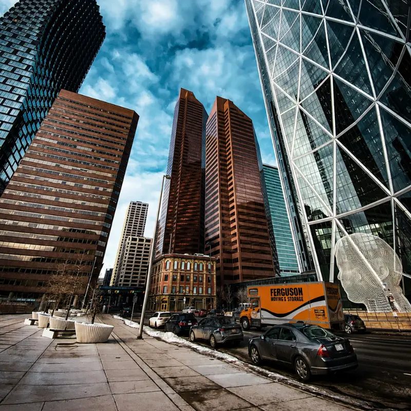 A Ferguson moviong truck driving in downtown Calgary